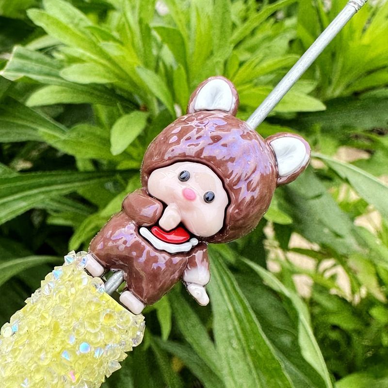 Cartoon staande figuur Monchic - Mobile Electronics Gadgets recensie en prijs